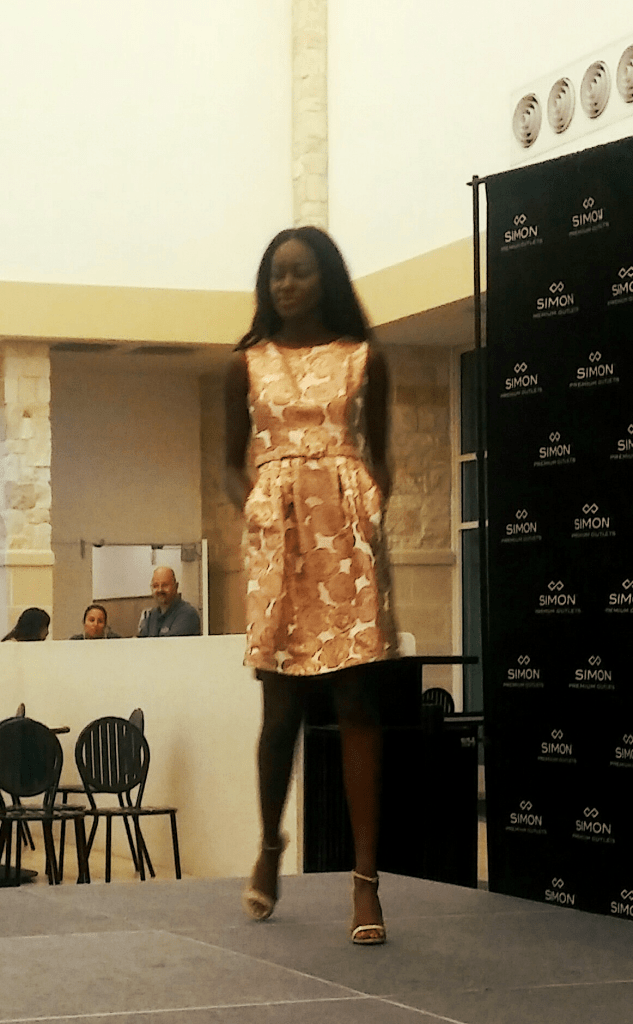 Runway model in Gold Dress